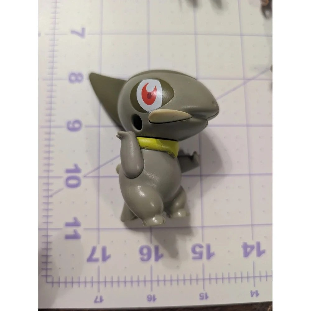 Pokemon Axew Mini Figure Dragon Type Collectible Toy Olive Green 2 Inch